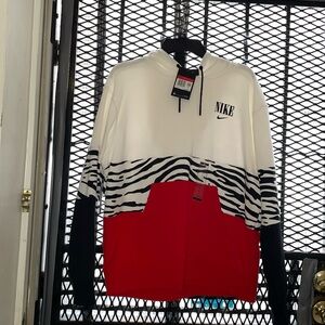 Medium loose fit Nike hooded sweatshirt.